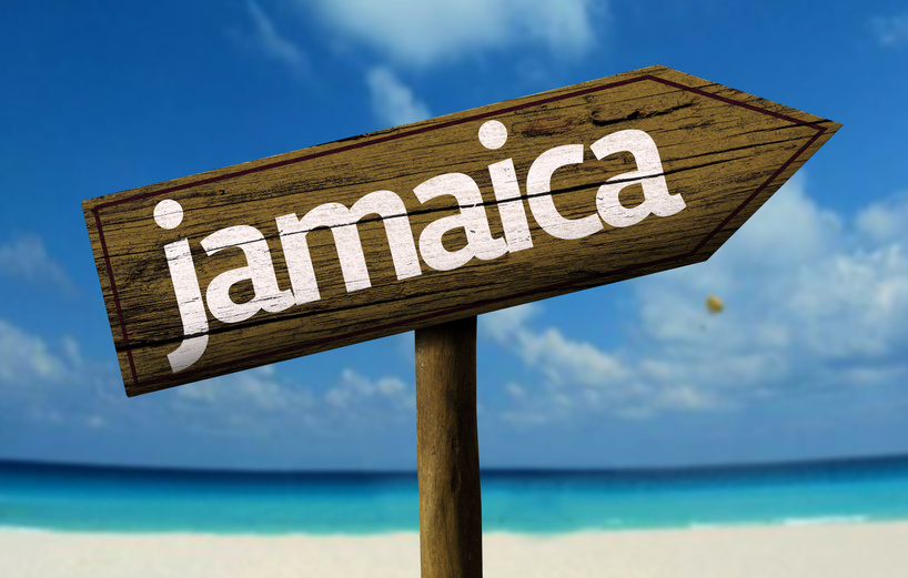 Jamaica wooden sign on the beach